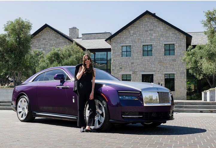 woman with a Royce Rolls Spectre